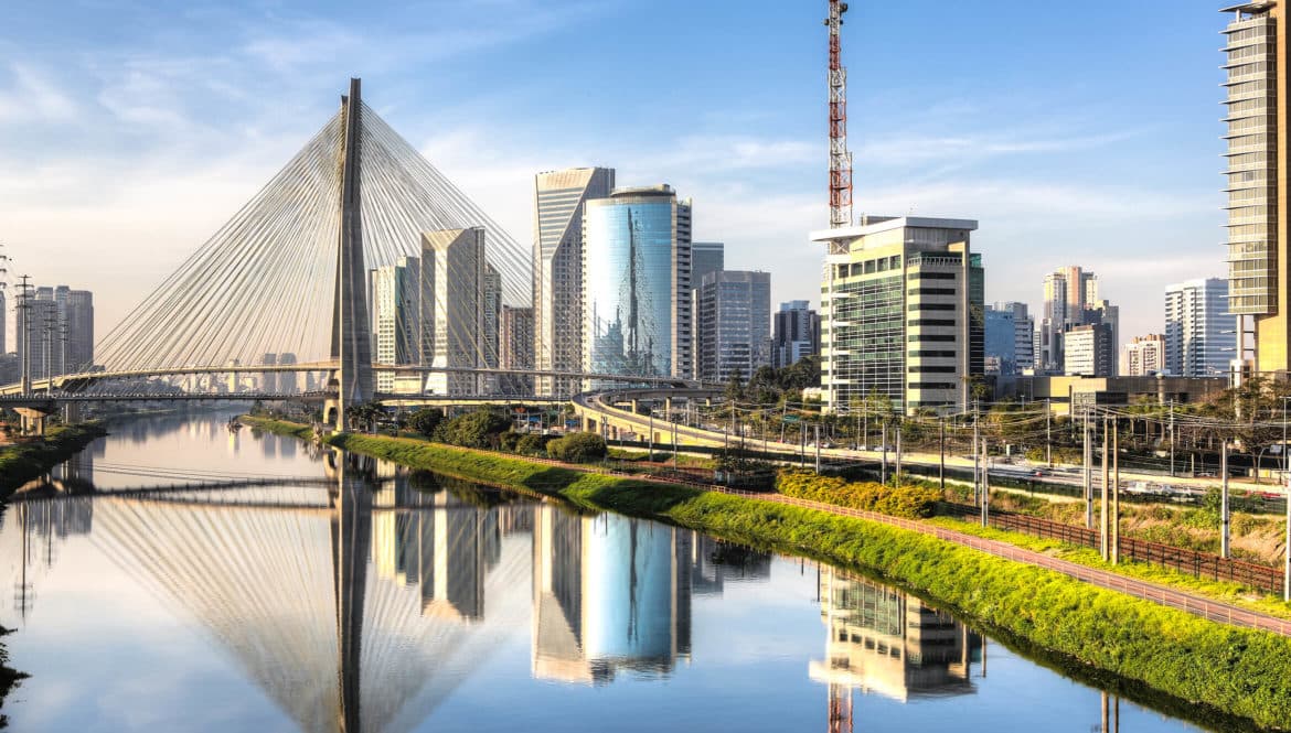 A city river flanked by skyscrapers to satisfy wanderlust.