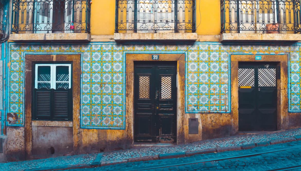 A Lisbon building with a balcony ideal for a digital nomad.