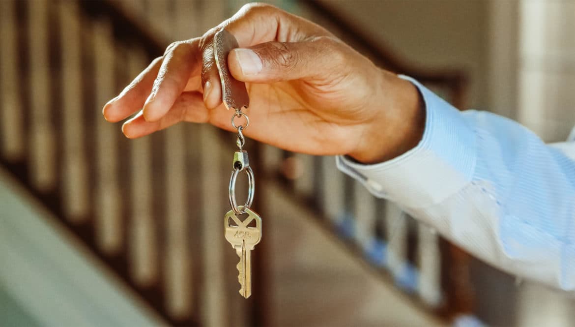 person holding a key