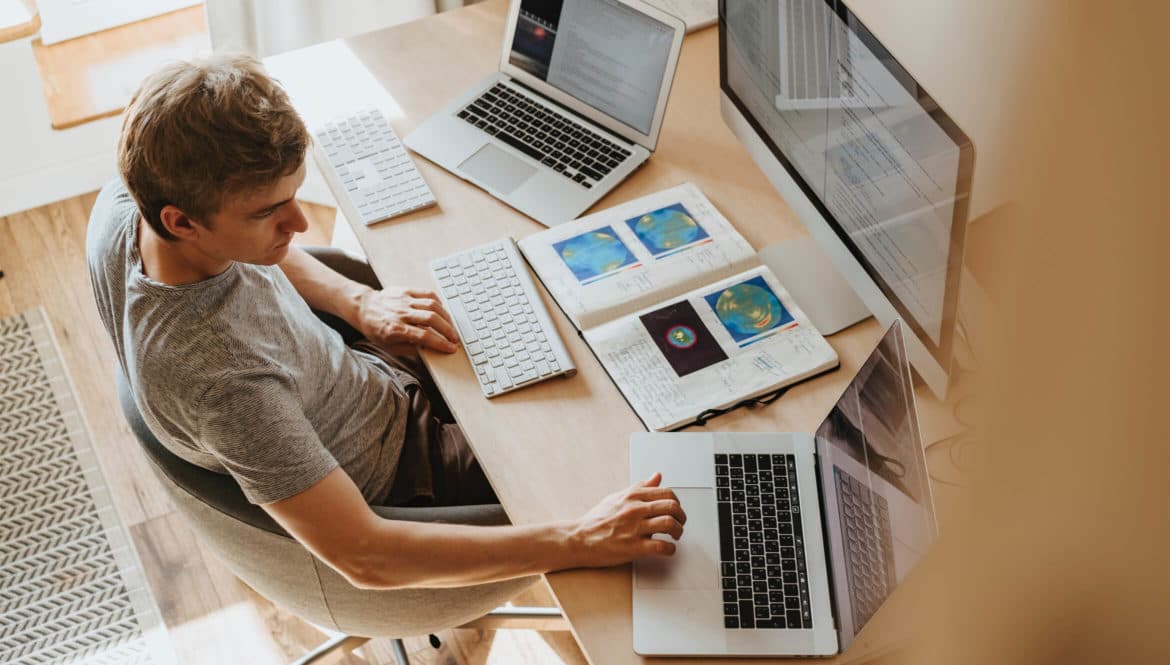 A remote-first man using a laptop.